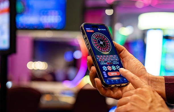 bosjoko apk Ikan Jackpot fishing game interface with fish symbols and progressive jackpot meter